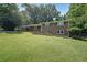 Charming brick home featuring a lush green lawn and mature trees at 1850 Donald Dr, Marietta, GA 30062