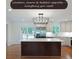 Bright kitchen with a large island, stainless steel refrigerator, and white cabinetry at 1850 Donald Dr, Marietta, GA 30062