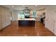 Spacious eat-in kitchen featuring a central island, stainless steel appliances, and hardwood floors at 1850 Donald Dr, Marietta, GA 30062