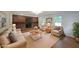 Cozy living room featuring a large fireplace, neutral decor, and hardwood floors at 1850 Donald Dr, Marietta, GA 30062