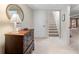 Finished basement featuring a dresser, staircase, and carpet flooring at 217 Millbrook Farm Rd, Marietta, GA 30068