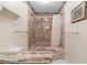 Uniquely designed bathroom featuring a marble shower and accents throughout at 217 Millbrook Farm Rd, Marietta, GA 30068