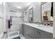 Stylish bathroom with a double sink vanity, white subway tile shower, and modern fixtures for a spa-like feel at 217 Millbrook Farm Rd, Marietta, GA 30068