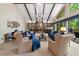 Spacious living room featuring a stone fireplace, vaulted ceilings, and natural light at 217 Millbrook Farm Rd, Marietta, GA 30068