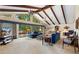Bright living room boasts vaulted ceilings, exposed beams, and large windows with serene outdoor views at 217 Millbrook Farm Rd, Marietta, GA 30068