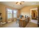 Home office features a built-in desk with windows and great lighting at 2235 Well Springs Dr Dr, Buford, GA 30519