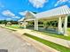 Open-air pavilion with picnic tables, offering a relaxing lakeside setting at 65 Orchard Dr, Covington, GA 30014