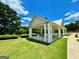 Community pavilion providing shaded seating and a pleasant gathering spot with nearby walking path at 65 Orchard Dr, Covington, GA 30014
