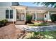 Classic home featuring a charming porch with a manicured lawn and inviting walkway at 65 Orchard Dr, Covington, GA 30014