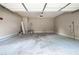 Spacious two car garage offering ample room for storage and parking at 65 Orchard Dr, Covington, GA 30014