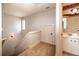 Hallway showing stairs, access to bathroom, and closet at 65 Orchard Dr, Covington, GA 30014