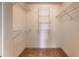 Walk-in closet featuring carpeted floors and wire shelving at 65 Orchard Dr, Covington, GA 30014