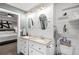 Modern bathroom with dual sinks, white shiplap walls, and stylish fixtures at 126 Laguna Springs Dr, Woodstock, GA 30188