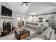 Open concept living room flows into the kitchen with great natural light at 126 Laguna Springs Dr, Woodstock, GA 30188