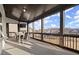 Screened-in patio with outdoor dining set, fan, and great views of the backyard and community at 1590 Branthaven Ln, Auburn, GA 30011