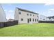 Spacious backyard with a privacy fence and green grass at 203 Creek View Ln, Acworth, GA 30102