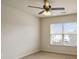 Neutral bedroom with carpet, a window and ceiling fan at 203 Creek View Ln, Acworth, GA 30102