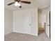 Neutral bedroom with carpet and two doors at 203 Creek View Ln, Acworth, GA 30102