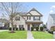 Charming two-story home featuring well-maintained landscaping and a welcoming front entrance at 203 Creek View Ln, Acworth, GA 30102