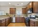 Kitchen with stainless steel appliances, granite countertops and hardwood floors at 203 Creek View Ln, Acworth, GA 30102