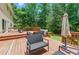 Exterior shot of a deck featuring outdoor seating and a grill at 4773 Aberdeen Ln, Stone Mountain, GA 30083
