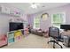 Bedroom featuring carpet, a ceiling fan, two windows and lots of shelving at 4773 Aberdeen Ln, Stone Mountain, GA 30083