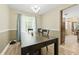 Inviting dining room featuring a large wooden table with seating and natural light at 4773 Aberdeen Ln, Stone Mountain, GA 30083