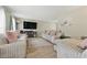 Bright living room with comfortable seating and a modern entertainment setup at 4773 Aberdeen Ln, Stone Mountain, GA 30083