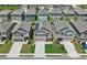 Aerial view of neighborhood showing manicured lawns and consistent home styles at 11684 Stovall Place Pl, Hampton, GA 30228