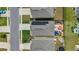 Overhead aerial view of home with patio and solar panels at 11684 Stovall Place Pl, Hampton, GA 30228