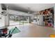 Spacious two-car garage with epoxy floors and ample storage solutions, great for organization at 11684 Stovall Place Pl, Hampton, GA 30228