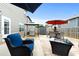 Outdoor patio with grill, dining set, fire pit, seating and fenced in yard at 11684 Stovall Place Pl, Hampton, GA 30228
