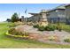 Entrance sign to Towne Center neighborhood with landscaping at 11684 Stovall Place Pl, Hampton, GA 30228