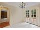 Bright dining room featuring tiled floors and direct access to the outdoor deck at 1338 Nonie Way, Marietta, GA 30062