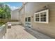 Back deck with a wooden bench overlooking fenced backyard at 3015 Cranbrook Nw Walk, Kennesaw, GA 30144