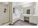 Bathroom with double vanity sinks, stand alone shower and large soaking tub at 3015 Cranbrook Nw Walk, Kennesaw, GA 30144