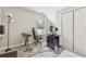 Bedroom with studio equipment, gaming chair, and closet storage at 3015 Cranbrook Nw Walk, Kennesaw, GA 30144