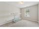 Neutral bedroom featuring a window and wall fixtures at 3015 Cranbrook Nw Walk, Kennesaw, GA 30144