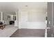 Inviting entryway featuring wainscoting, wood floors, and an open floorplan at 3015 Cranbrook Nw Walk, Kennesaw, GA 30144