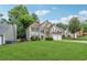 Beautiful two-story home featuring stone accents, a well-kept lawn, and a practical two-car garage at 3015 Cranbrook Nw Walk, Kennesaw, GA 30144