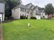 Charming two-story home with neutral siding, stone accents, and an attached two car garage at 3015 Cranbrook Nw Walk, Kennesaw, GA 30144