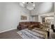 Large living room features high ceilings, brown leather couch, and an open floor plan at 3015 Cranbrook Nw Walk, Kennesaw, GA 30144