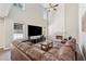 Bright living room boasts a vaulted ceiling, fireplace, and large windows, perfect for relaxation and entertainment at 3015 Cranbrook Nw Walk, Kennesaw, GA 30144