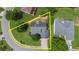 An aerial view of the property highlighting its position in a landscaped neighborhood and manicured lawn at 307 Cabinwood Trl, Canton, GA 30115