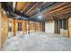 Unfinished basement with exposed framing and concrete floor at 307 Cabinwood Trl, Canton, GA 30115
