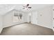Spacious bedroom with neutral walls, carpet, ceiling fan, and natural light at 307 Cabinwood Trl, Canton, GA 30115