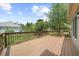 Spacious wooden deck offers beautiful views of the lush greenery at 307 Cabinwood Trl, Canton, GA 30115