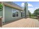 Exterior of home showing spacious wooden deck at 307 Cabinwood Trl, Canton, GA 30115