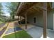 Exterior shot of the home's backyard deck with access to the yard at 307 Cabinwood Trl, Canton, GA 30115