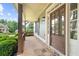 Charming front porch with stone accents, wood railings, and views of the landscaped yard and neighborhood at 307 Cabinwood Trl, Canton, GA 30115